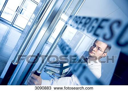 Man opening a glass door, slanted View Large Photo Image Stock Image - Man opening a glass door, slanted . Fotosearch