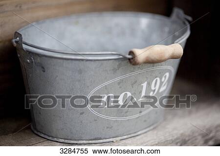 Metal bucket, close-up View Large Photo Image Stock Photography - Metal bucket, close-up . Fotosearch