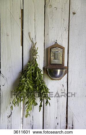 Mistletoe and stoup on wooden wall View Large Photo Image Stock Image - Mistletoe and stoup on wooden wall . Fotosearch