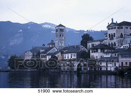 Stock Image - Monastery at lakeside, Lake Orta, Orta San Giulio, Piedmont, Italy . Fotosearch