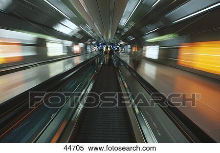 Stock Photography - Moving sidewalk at airport, Frankfurt, Germany . Fotosearch