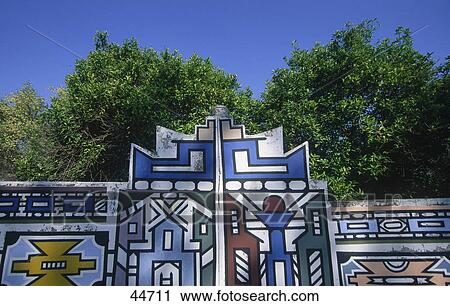 Stock Image - Ndebele paintings on wall, Mpumalanga Province, South Africa . Fotosearch