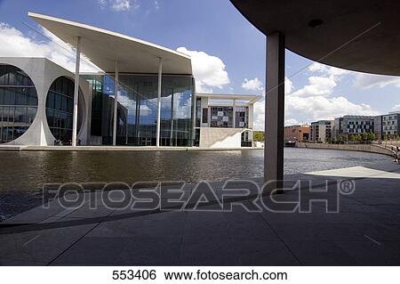 Stock Photograph - Office building on riverbank, Marie-Elisabeth-Lüders-Haus, Spree River, Berlin, Germany . Fotosearch