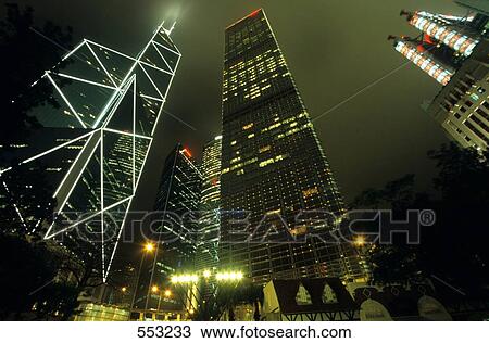 Office buildings lit up at night, Hong Kong, China View Large Photo Image Stock Image - Office buildings lit up at night, Hong Kong, China . Fotosearch