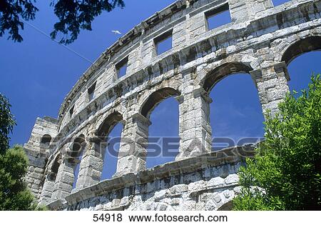 Stock Photo - Old ruins of roman amphitheatre, Pula, Istria, Croatia . Fotosearch