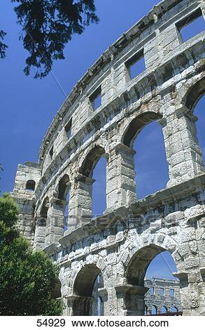 Stock Photo - Old ruins of roman amphitheatre, Pula, Istria, Croatia . Fotosearch