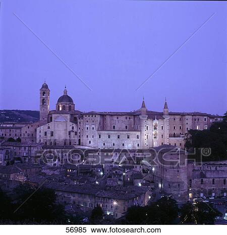 Stock Photography - Palace lit up at dusk, Palazzo Ducale, Urbino, Marken, Italy . Fotosearch