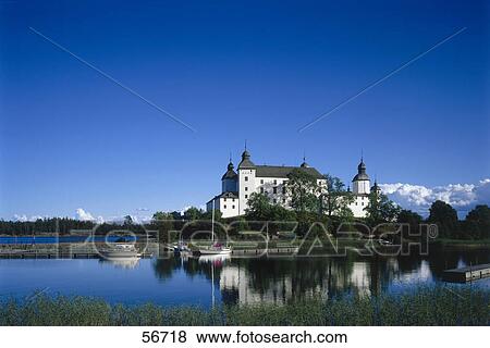 Stock Photo - Palace reflected on a lake . Fotosearch