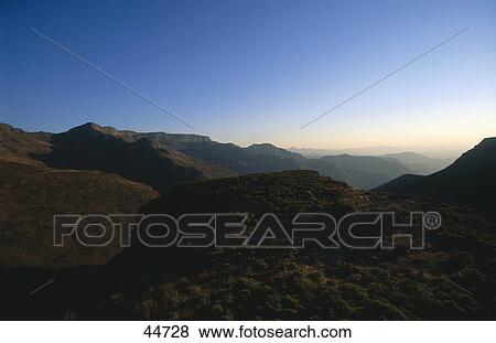 Panoramic view of mountain range, Drakensberg, Lesotho View Large Photo Image Stock Photo - Panoramic view of mountain range, Drakensberg, Lesotho . Fotosearch