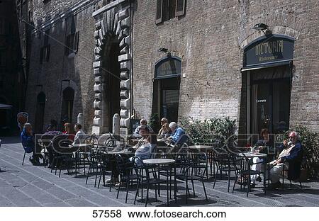 People at a sidewalk cafe, Piazza IV. Novembre, Assisi, Perugia Province, Umbria, Italy View Large Photo Image Stock Photo - People at a sidewalk cafe, Piazza IV. Novembre, Assisi, Perugia Province, Umbria, Italy . Fotosearch