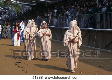 Stock Photo - People in costumes during festival, Asti, Piedmont, Italy . Fotosearch
