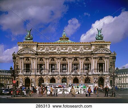 Stock Image - People in front of opera house . Fotosearch