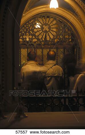 Stock Photo - People praying in a church, Basilica of Saint Clare, Assisi, Perugia Province, Umbria, Italy . Fotosearch