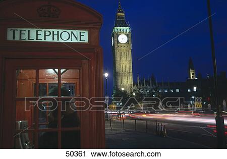 Person using public telephone in booth, Big Ben, London, England View Large Photo Image Stock Image - Person using public telephone in booth, Big Ben, London, England . Fotosearch