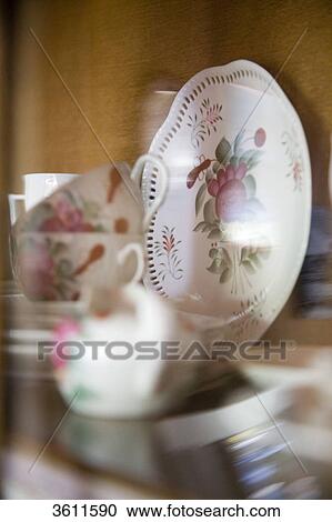 Stock Image - Plate and cups . Fotosearch