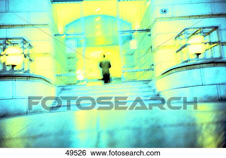 Rear view of man in front of door View Large Photo Image Stock Photograph - Rear view of man in front of door . Fotosearch