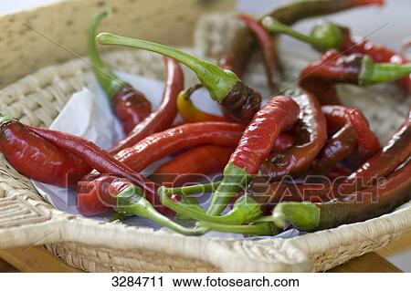 Red Chilli Peppers in a basket, close-up View Large Photo Image Stock Image - Red Chilli Peppers in a basket, close-up . Fotosearch