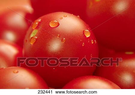 Stock Image - red tomatos, close-up . Fotosearch