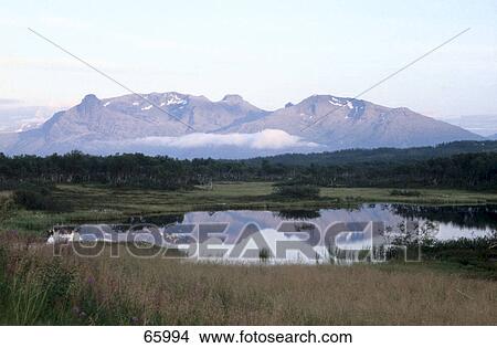 Reflection of mountains in pond, Narvik, Nordland, Norway View Large Photo Image Picture - Reflection of mountains in pond, Narvik, Nordland, Norway . Fotosearch