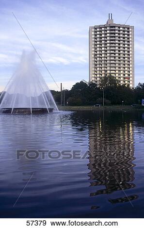 Reflection of skyscraper in water, Achen, North Rhine-Westphalia, Germany View Large Photo Image Stock Photo - Reflection of skyscraper in water, Achen, North Rhine-Westphalia, Germany . Fotosearch