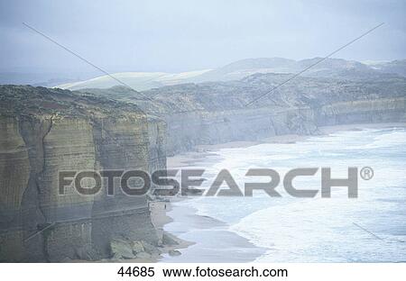 Stock Photography - River passing through rocks, Twelve Apostles Sea Rocks, Port Campbell National Park, Great Ocean Road, Victoria, Australia . Fotosearch