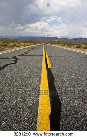 Road through Death Valley National Park, USA, vanishing point perspective View Large Photo Image Stock Image - Road through Death Valley National Park, USA, vanishing point perspective . Fotosearch