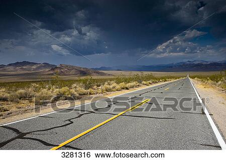 Road through Death Valley National Park, USA, vanishing point perspective View Large Photo Image Stock Photograph - Road through Death Valley National Park, USA, vanishing point perspective . Fotosearch