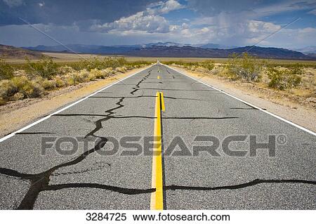 Road through Death Valley National Park, USA, vanishing point perspective View Large Photo Image Stock Photography - Road through Death Valley National Park, USA, vanishing point perspective . Fotosearch
