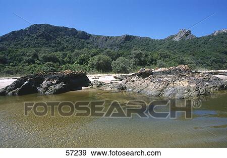 Rock formation on beach, Eastern Cape, South Africa View Large Photo Image Stock Photo - Rock formation on beach, Eastern Cape, South Africa . Fotosearch