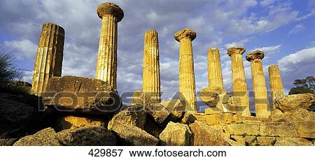 Stock Photo - Ruins of colonnade of temple, Temple of Heracles, Sicily, Italy . Fotosearch