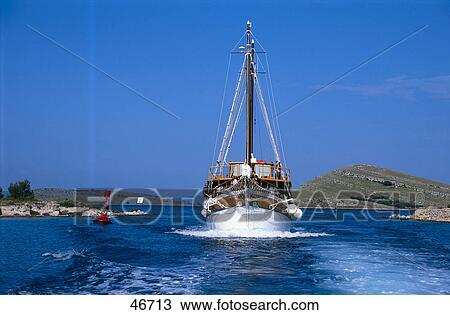 Stock Image - Sailboat in sea, Kornati National Park, Croatia . Fotosearch