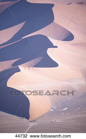 Stock Image - Sand dune in desert, Dune 45, Sossusvlei, Namib Desert, Namibia . Fotosearch