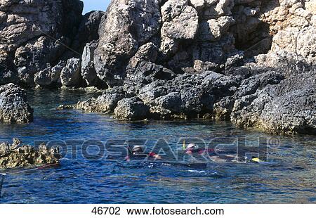 Scuba divers snorkelling in bay, Komiza, Vis, Dalmatia, Croatia View Large Photo Image Stock Image - Scuba divers snorkelling in bay, Komiza, Vis, Dalmatia, Croatia . Fotosearch