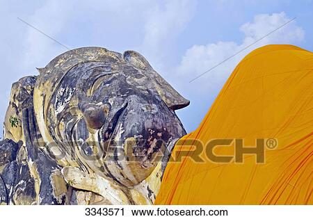 Sculpture of lying Buddha, Wat Lokayasutha, Ayutthaya, Thailand, detail View Large Photo Image Stock Image - Sculpture of lying Buddha, Wat Lokayasutha, Ayutthaya, Thailand, detail . Fotosearch