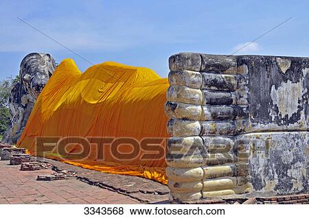 Sculpture of lying Buddha, Wat Lokayasutha, Ayutthaya, Thailand View Large Photo Image Stock Photo - Sculpture of lying Buddha, Wat Lokayasutha, Ayutthaya, Thailand . Fotosearch