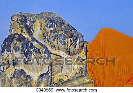 Sculpture of lying Buddha, Wat Lokayasutha, Ayutthaya, Thailand, detail View Large Photo Image Stock Photo - Sculpture of lying Buddha, Wat Lokayasutha, Ayutthaya, Thailand, detail . Fotosearch