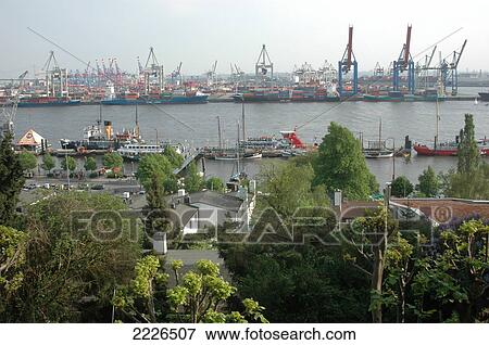 Stock Photo - Ships near commercial dock, Hamburg, Germany . Fotosearch