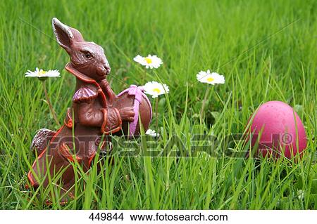 Side profile Easter bunny and egg View Large Photo Image Picture - Side profile Easter bunny and egg . Fotosearch