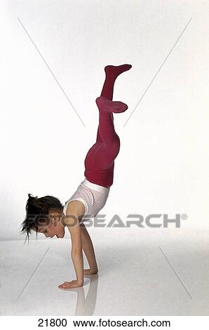 Side profile of a girl doing gymnastics View Large Photo Image Stock Image - Side profile of a girl doing gymnastics . Fotosearch