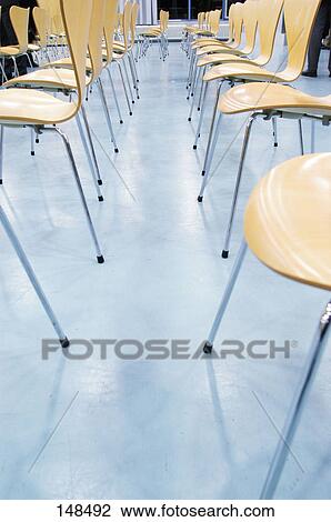 Side profile of empty chairs of concert hall View Large Photo Image Stock Image - Side profile of empty chairs of concert hall . Fotosearch