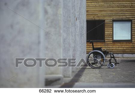 Stock Image - Side profile of wheelchair . Fotosearch