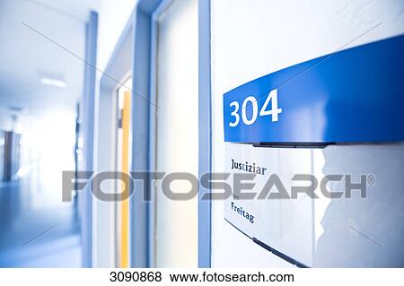 Sign beside a door at an office corridor, close-up View Large Photo Image Stock Photo - Sign beside a door at an office corridor, close-up . Fotosearch