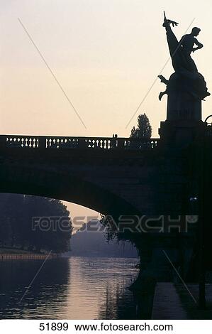 Stock Photo - Silhouette of bridge across river, Ponte Umberto, Turin, Piedmont, Italy . Fotosearch