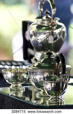 Silvery tea set, close-up View Large Photo Image Stock Photography - Silvery tea set, close-up . Fotosearch