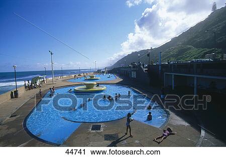 Stock Image - Swimming pool on beach, Brighton Beach, Durban, KwaZulu-Natal, South Africa . Fotosearch
