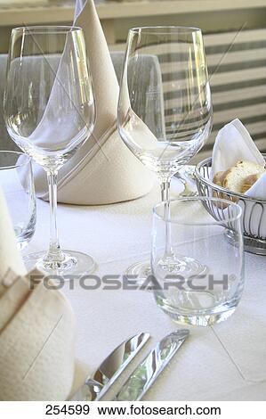 Stock Photo - Table in restaurant set for two people . Fotosearch