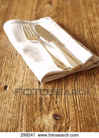 Table knife and fork on napkin View Large Photo Image Stock Image - Table knife and fork on napkin . Fotosearch