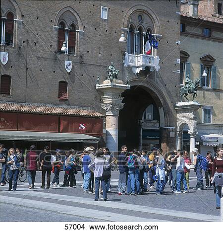 Picture - Tourist in street, Palazzo Comunale, Piazza Trento e Triest, Emilia Romagna, Italy . Fotosearch