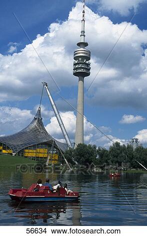 Tourist on boat in lake, Olympic Tower, Munich, Germany View Large Photo Image Picture - Tourist on boat in lake, Olympic Tower, Munich, Germany . Fotosearch