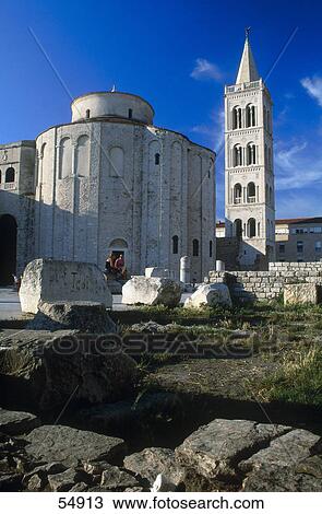 Stock Image - Tourists at ancient roman ruins, church of Saint Donat, Zadar, Dalmatia, Croatia . Fotosearch
